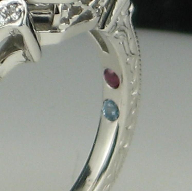 23 rssd3yr92czxclq7v4_engagement-ring-with-birthstones-on-the-inner-band-via德赢与ac米兰手机-custommade.jpeg
