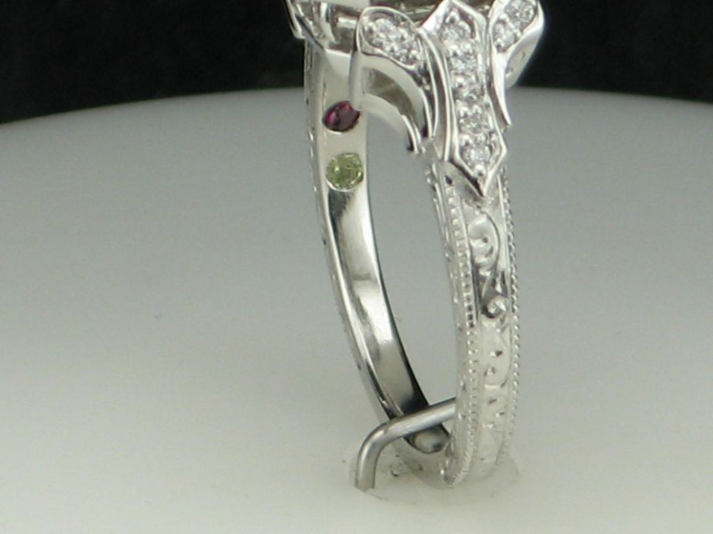 PoKxlURbTHePl7x90eh1_Engagement-ring-with-inlaid-birthstones-for-family-members-via-德赢与ac米兰手机CustomMade.jpeg